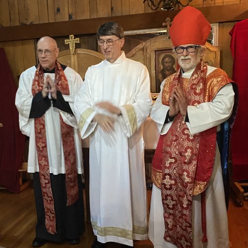 Monsignor Charles Scheetz, Deacon John Friedline and Archbishop David Cooper.